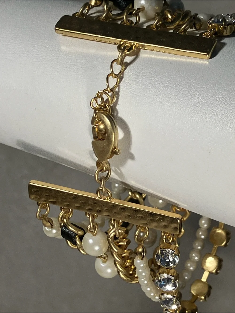 Pearls, goldtone and crystal ‘Fashion Scene’ 6 strand bracelet